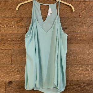 Socialite light blue blouse.